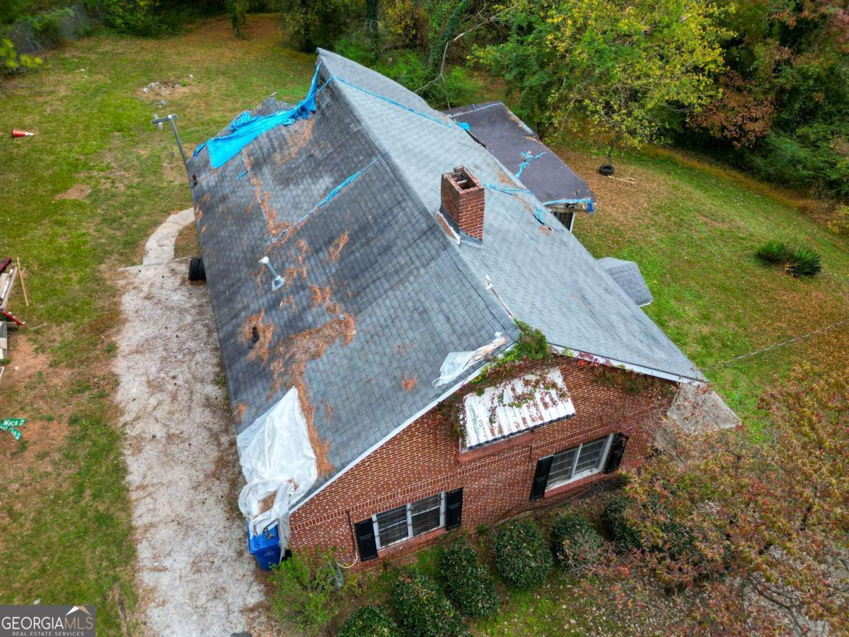 1345 Gun Club Road Northwest Atlanta, GA 30318 - Photo 8 of 12 an aerial view of a house with a yard basket ball court and outdoor seating