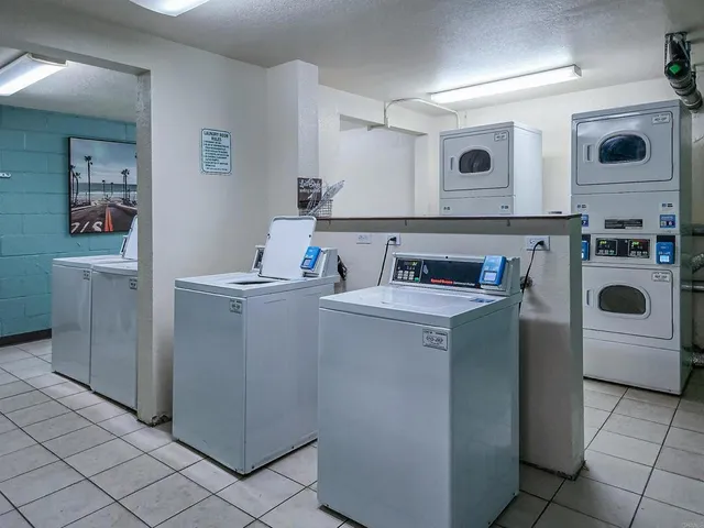 a utility room with washer and dryer