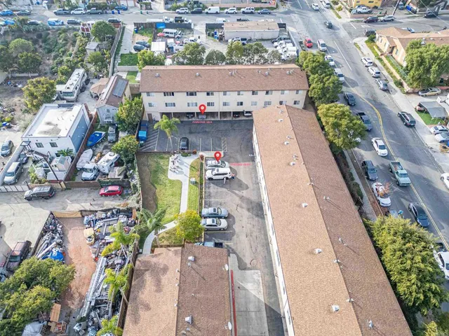 an aerial view of a house with outdoor space