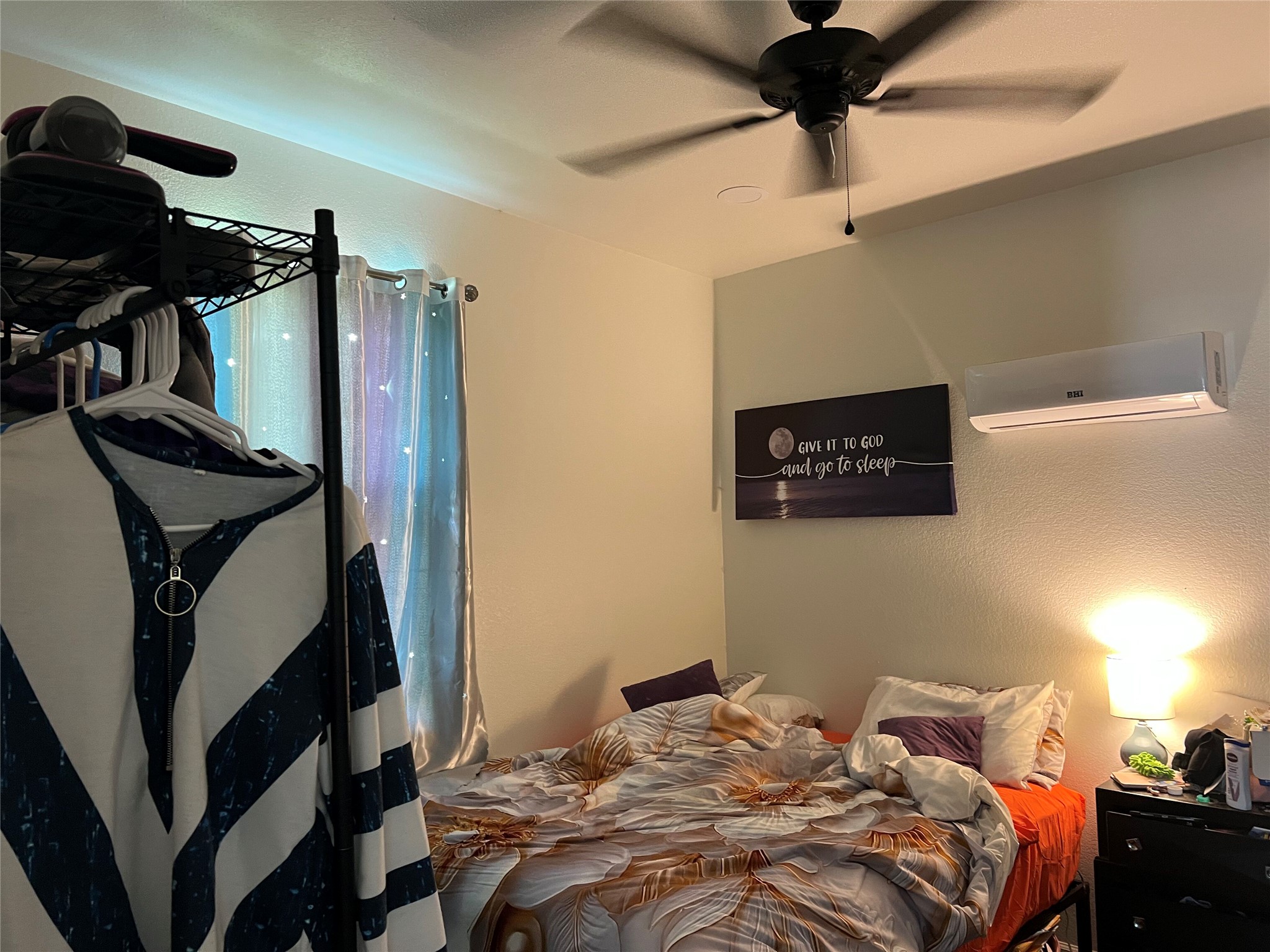 0 Ranch Road 2545 Kingsland, TX 78639 - Photo 14 of 22 a bedroom with a bed and a chandelier