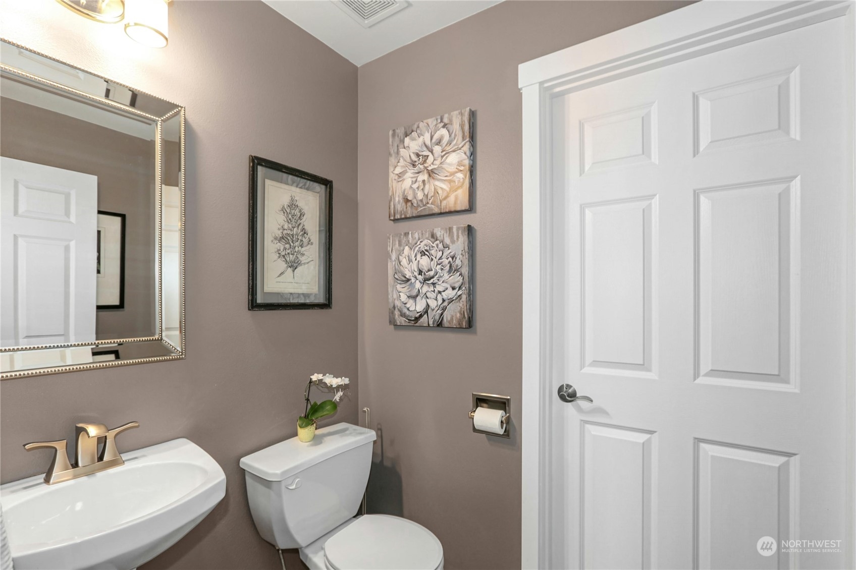 15028 51st Drive Southeast Bothell, WA 98012 - Photo 14 of 31 a bathroom with a toilet a sink and mirror