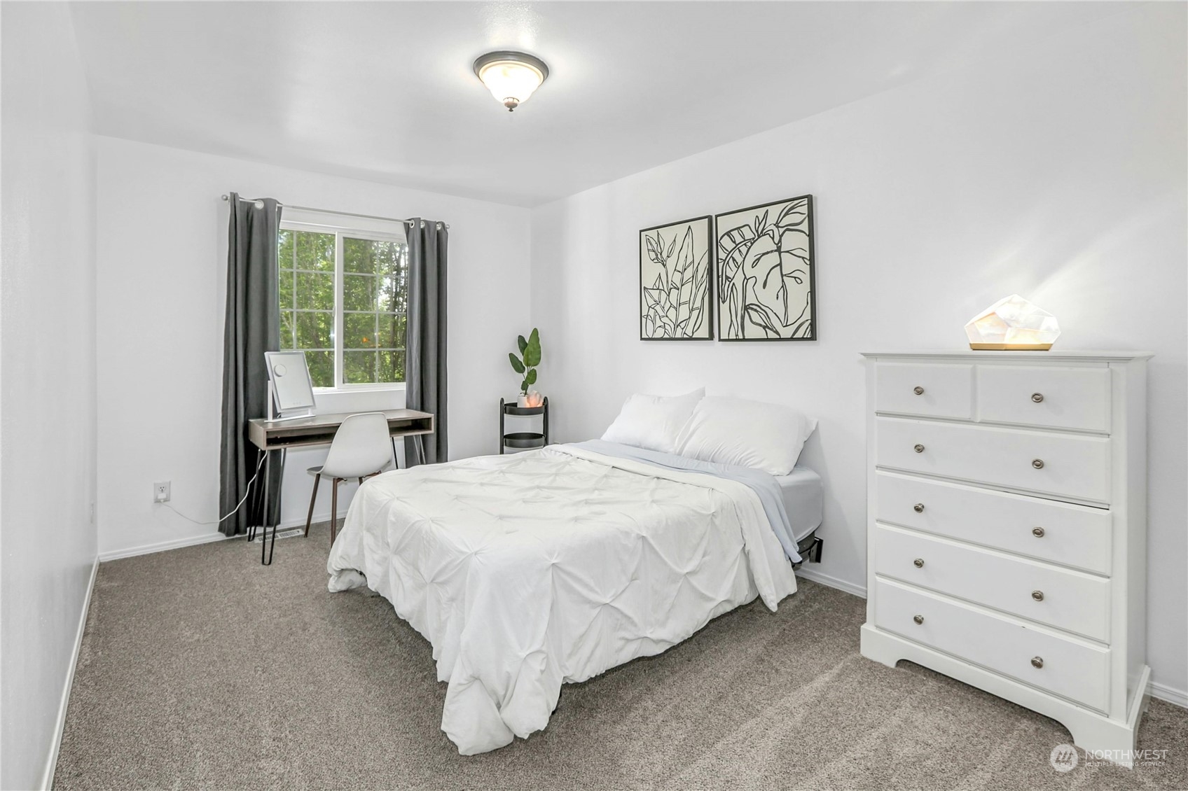 15028 51st Drive Southeast Bothell, WA 98012 - Photo 20 of 31 a bedroom with a bed and a window