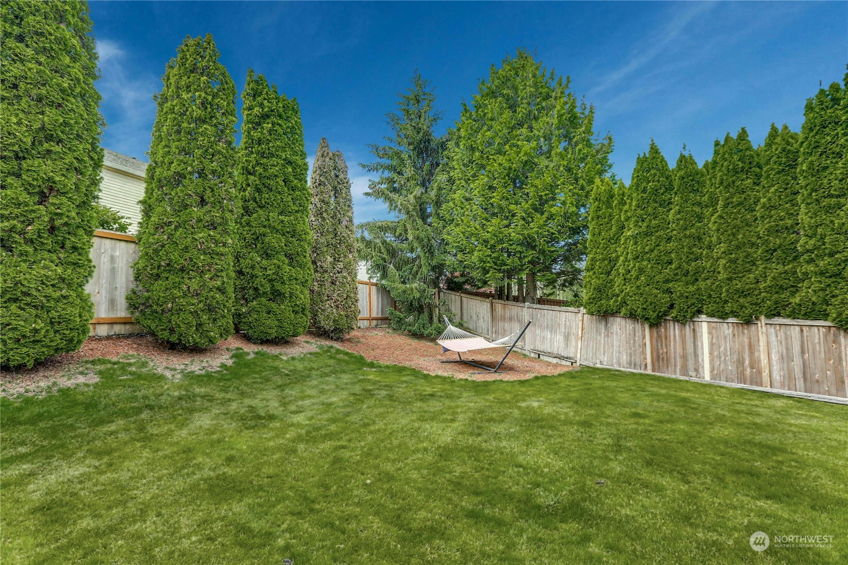 15028 51st Drive Southeast Bothell, WA 98012 - Photo 28 of 31 a view of a backyard with a small cabin
