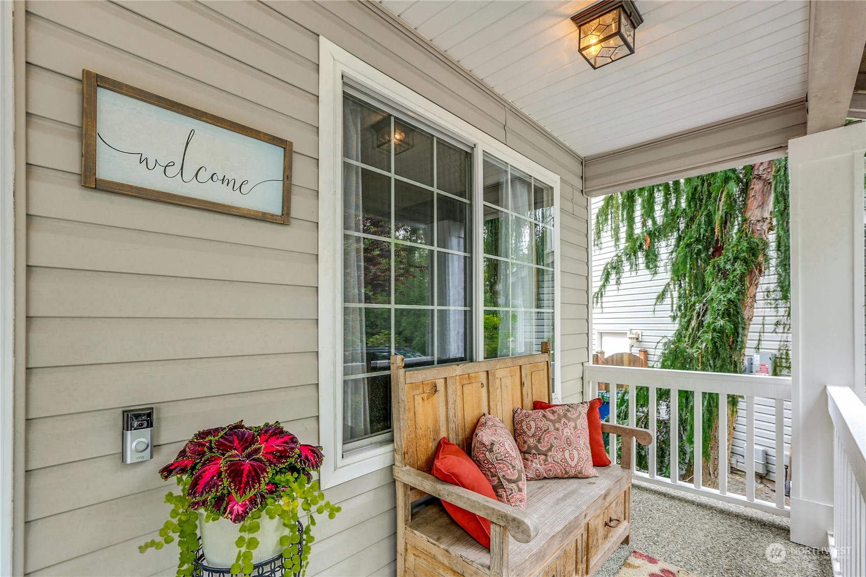 15028 51st Drive Southeast Bothell, WA 98012 - Photo 4 of 31 a balcony view with table and a potted plant