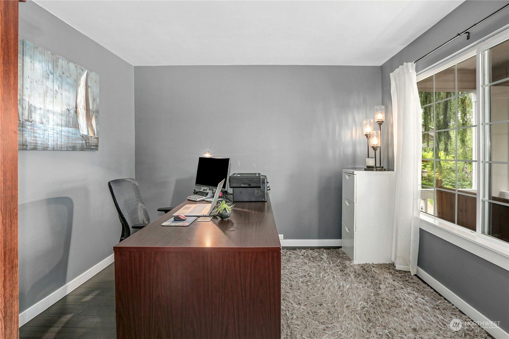 15028 51st Drive Southeast Bothell, WA 98012 - Photo 7 of 31 a work room with furniture and windows