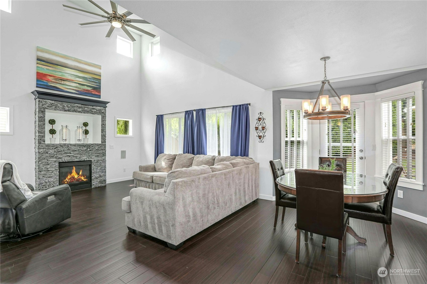 15028 51st Drive Southeast Bothell, WA 98012 - Photo 9 of 31 a living room with furniture and a fireplace