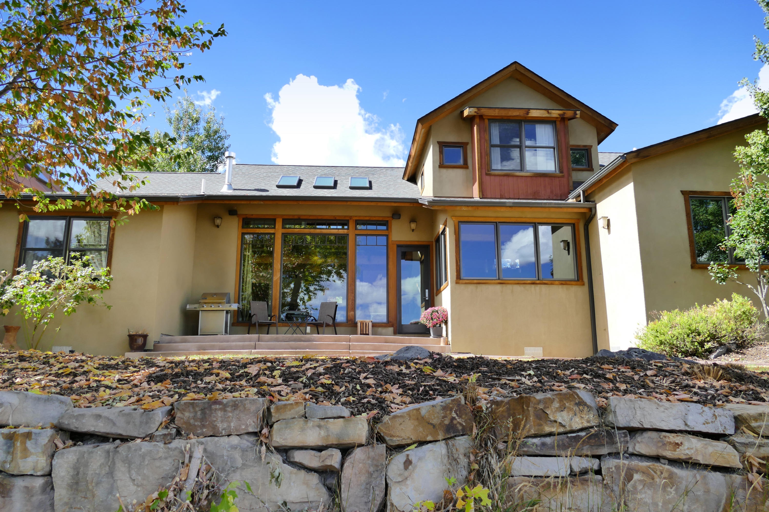 420 Amy Way Ridgway, CO 81432 - Photo 14 of 17 a front view of a house with a yard