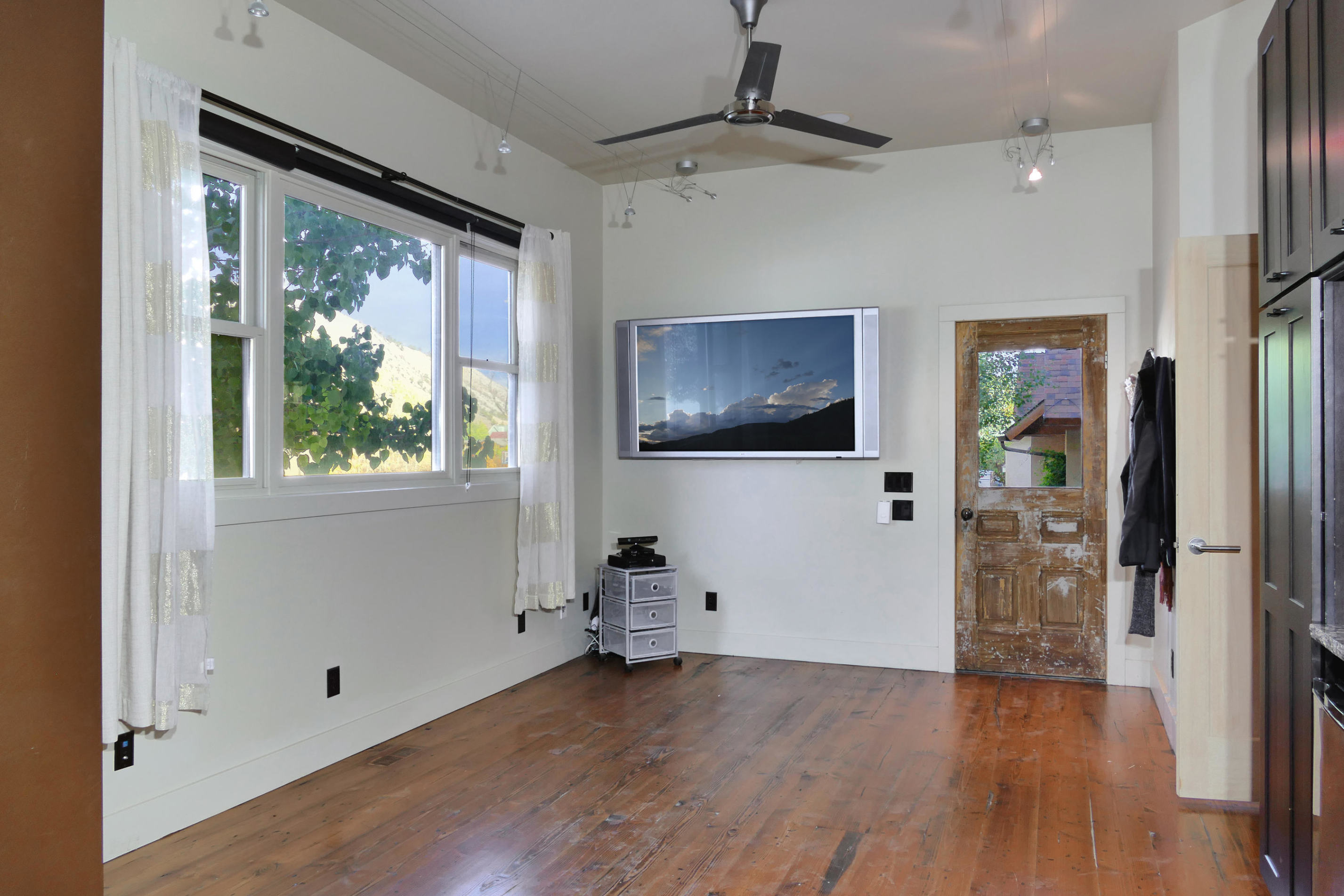 420 Amy Way Ridgway, CO 81432 - Photo 15 of 17 a view of empty room with wooden floor and fan