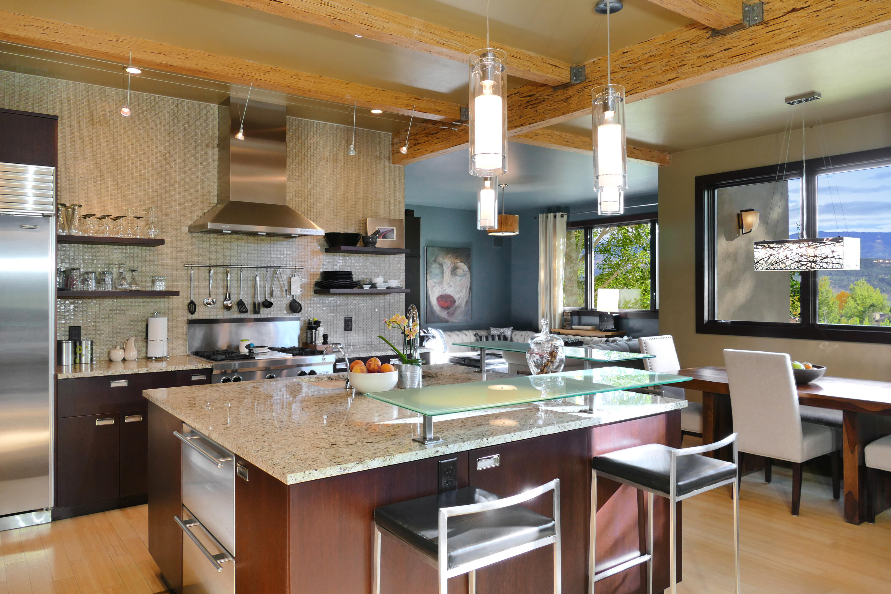 420 Amy Way Ridgway, CO 81432 - Photo 5 of 17 a kitchen with a table chairs stove and cabinets