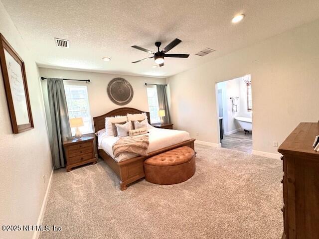 34424 Mitigation Trail Callahan, FL 32011 - Photo 14 of 44 a bedroom with a large bed and a window