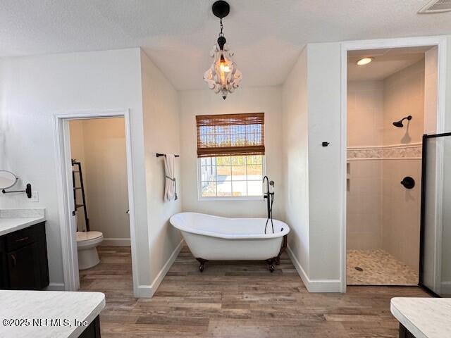 34424 Mitigation Trail Callahan, FL 32011 - Photo 15 of 44 a spacious bathroom with a sink a toilet a shower and a mirror