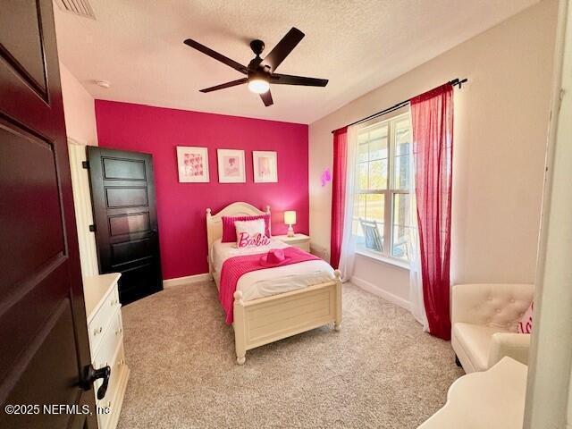 34424 Mitigation Trail Callahan, FL 32011 - Photo 18 of 44 a bedroom with a bed and a large window