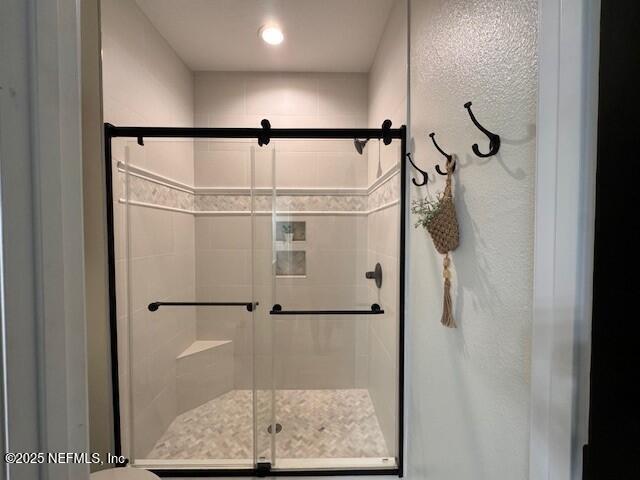 34424 Mitigation Trail Callahan, FL 32011 - Photo 21 of 44 a bathroom with a shower