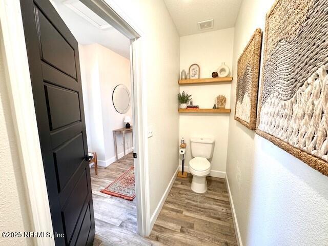 34424 Mitigation Trail Callahan, FL 32011 - Photo 22 of 44 a bathroom with a toilet and a shower