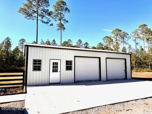 34424 Mitigation Trail Callahan, FL 32011 - Photo 32 of 44 a view of a house with a tree