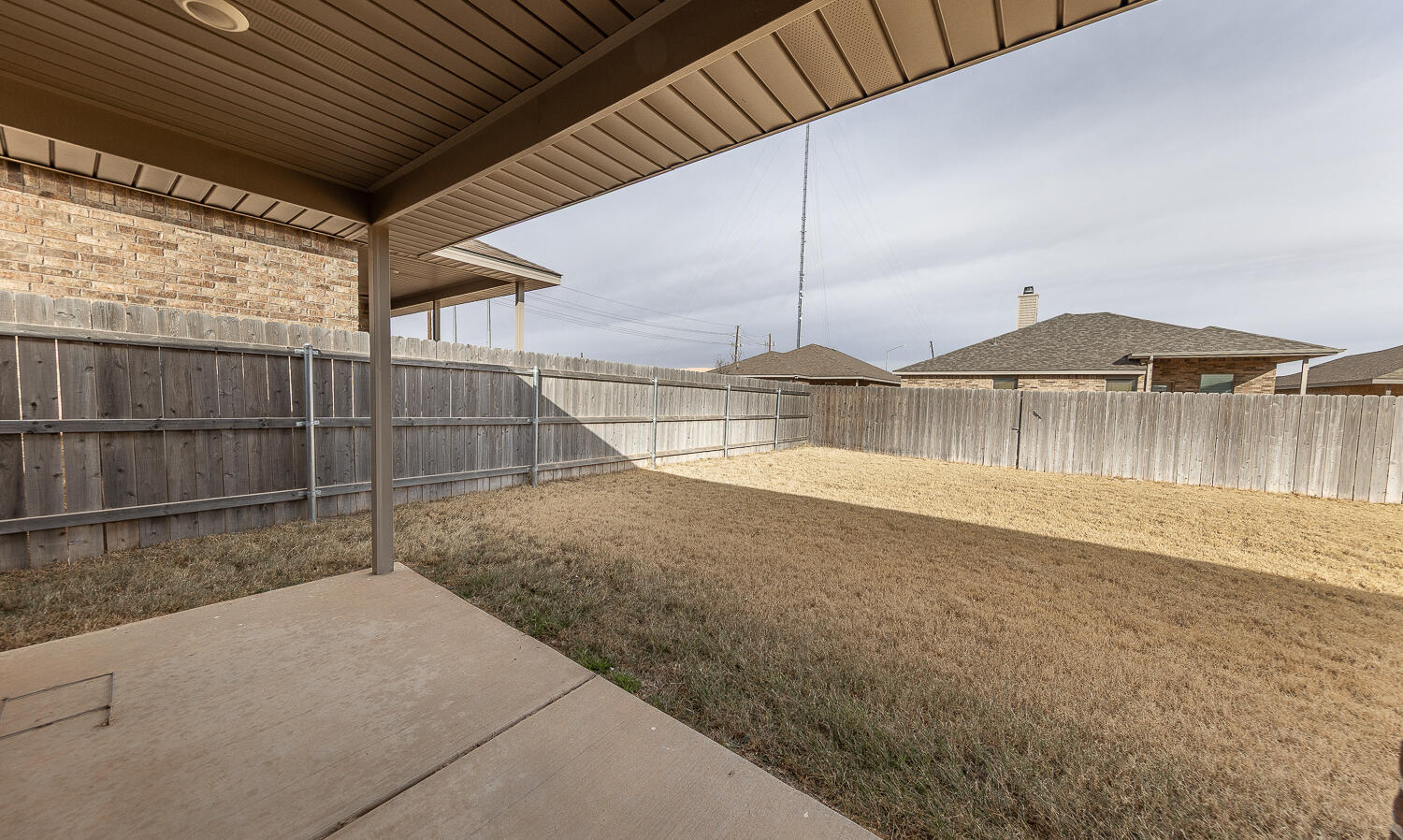 7526 31st Place Lubbock, TX 79407 - Photo 18 of 22 a view of a backyard of a house