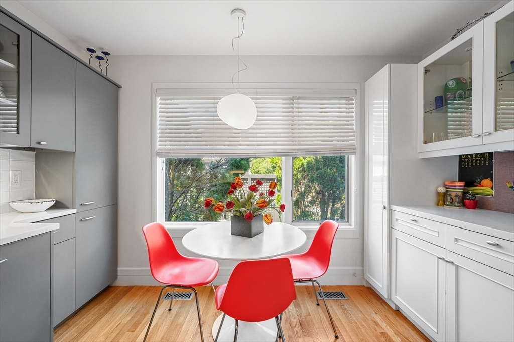 277 Nahanton Street, Unit 277 Newton, MA 02459 - Photo 14 of 39 a view of a dining room with furniture window and outside view