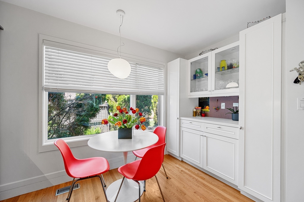 277 Nahanton Street, Unit 277 Newton, MA 02459 - Photo 15 of 39 a view of a dining room with furniture window and outside view
