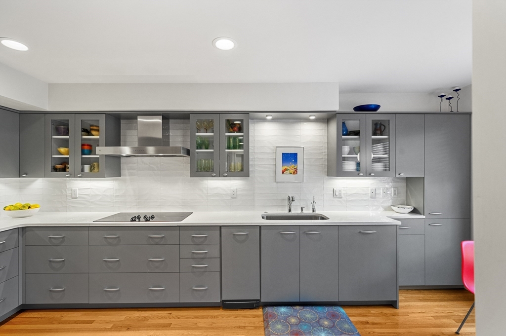 277 Nahanton Street, Unit 277 Newton, MA 02459 - Photo 16 of 39 a kitchen with sink and cabinets