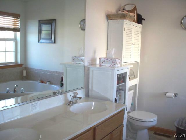 2776 Maefield Road Bath, PA 18014 - Photo 15 of 28 a bathroom with a sink a toilet and tub