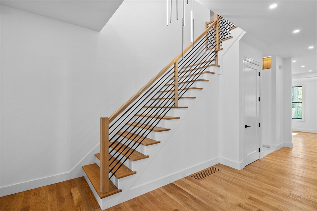 34 Garrison Road Wellesley, MA 02482 - Photo 11 of 28 a view of an entryway with wooden floor