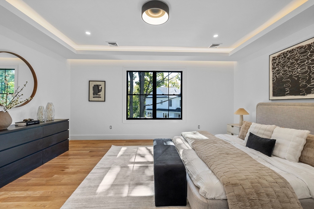 34 Garrison Road Wellesley, MA 02482 - Photo 12 of 28 a bedroom with a bed and a window