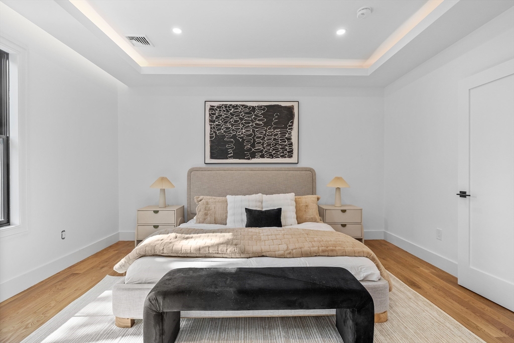 34 Garrison Road Wellesley, MA 02482 - Photo 13 of 28 a bedroom with a bed and a window