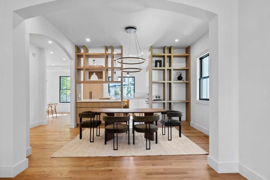34 Garrison Road Wellesley, MA 02482 - Photo 2 of 28 a view of a dining room with furniture and wooden floor