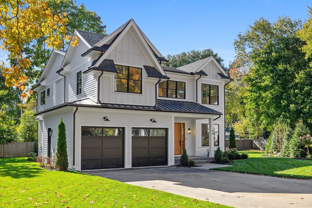 34 Garrison Road Wellesley, MA 02482 - Photo 28 of 28 front view of a house with a yard