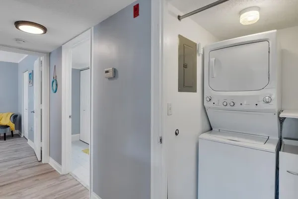 a view of bathroom with a washer and dryer