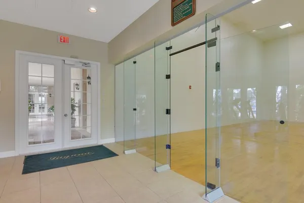 a bathroom with a shower and a bath tub