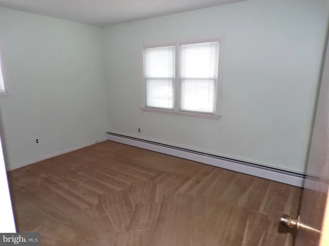 a view of a room with a window