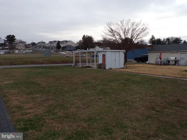 a house view with a garden space