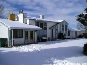 Home built as split entry/bi-level home. Previous owner added family room on south side & office w/separate entrance & full bath on the north side. Both add ons have wood burning stove & no HVAC. This in the main floor on MLS & not incl in the sq footage.