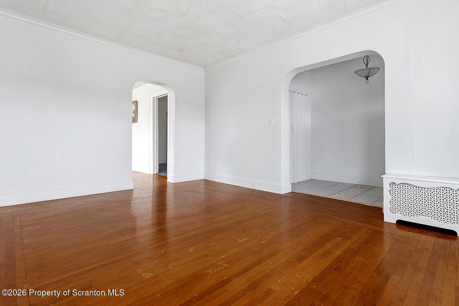 846 Monroe Avenue Scranton, PA 18510 - Photo 14 of 87 an empty room with wooden floor and closet