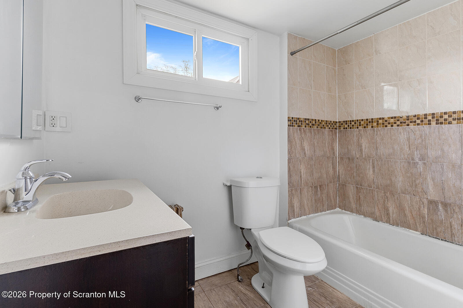 846 Monroe Avenue Scranton, PA 18510 - Photo 21 of 87 a white toilet sitting next to a bathroom sink