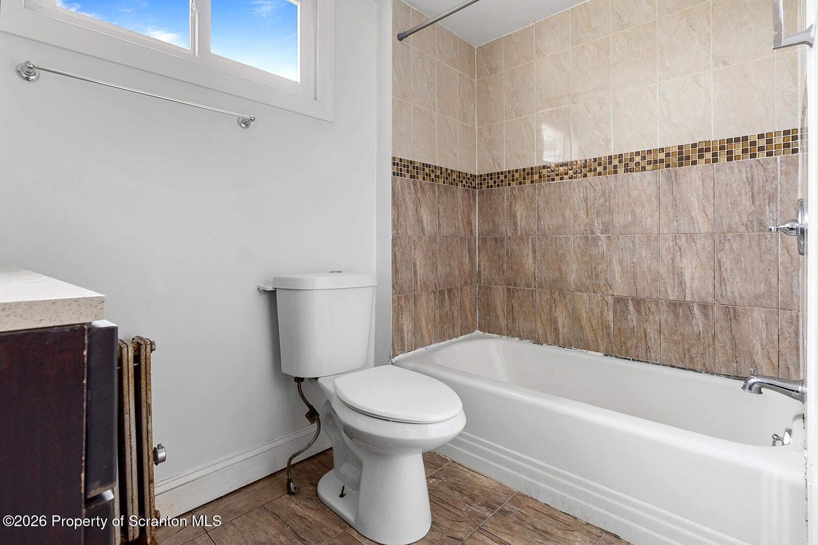 846 Monroe Avenue Scranton, PA 18510 - Photo 22 of 87 a bathroom with a toilet and a bathtub