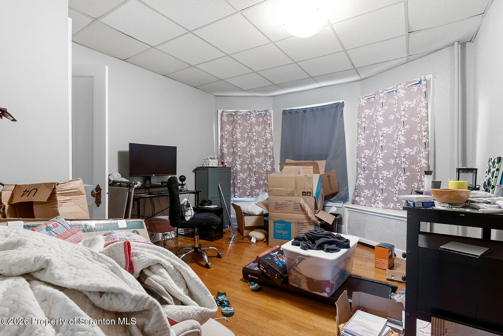 846 Monroe Avenue Scranton, PA 18510 - Photo 34 of 87 a bedroom with furniture and a flat screen tv