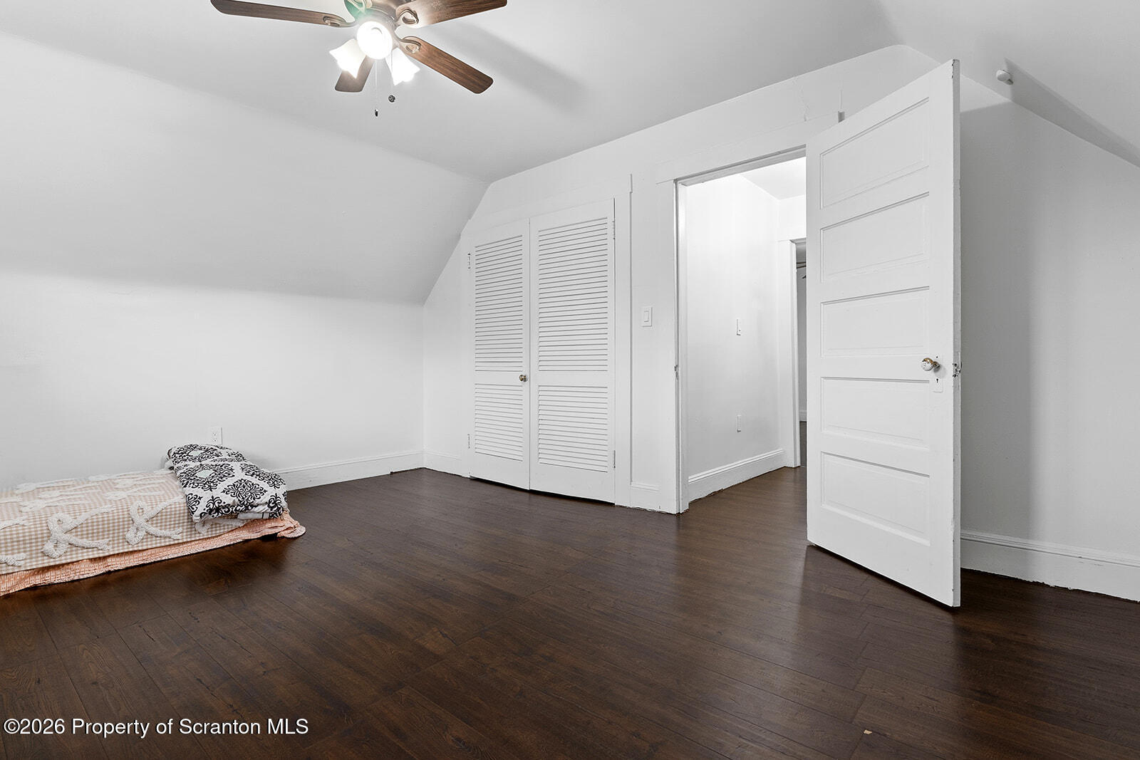846 Monroe Avenue Scranton, PA 18510 - Photo 46 of 87 an empty room with wooden floor and ceiling fan