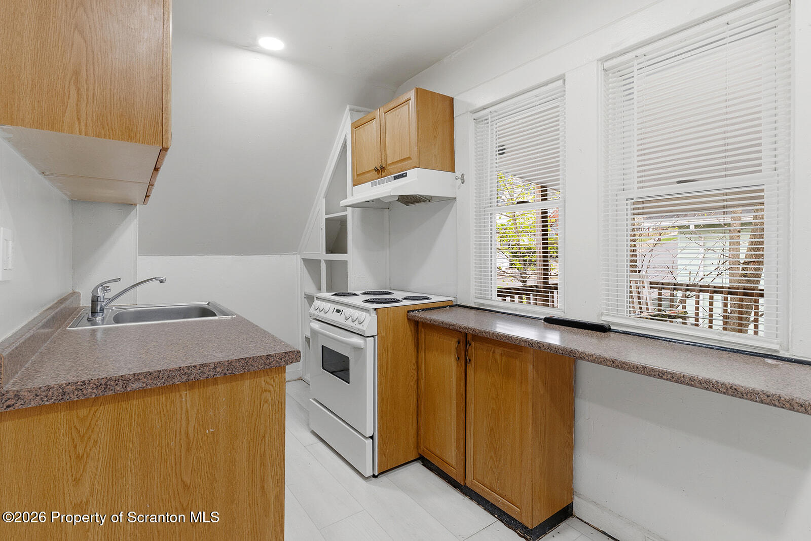 846 Monroe Avenue Scranton, PA 18510 - Photo 54 of 87 a kitchen with a sink stove and refrigerator