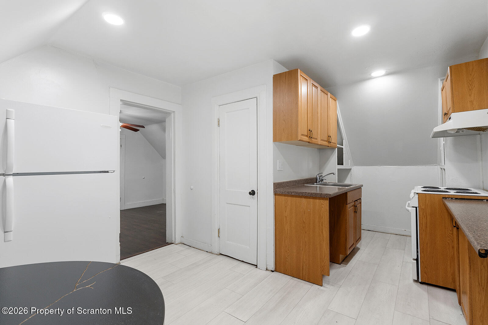 846 Monroe Avenue Scranton, PA 18510 - Photo 55 of 87 a kitchen with stainless steel appliances granite countertop a refrigerator a stove and a sink