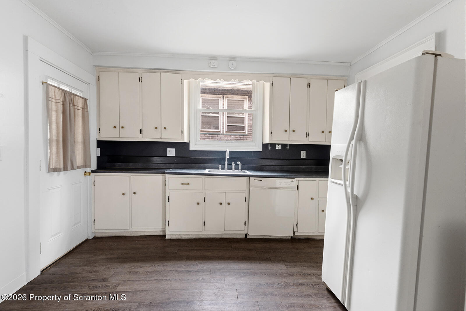 846 Monroe Avenue Scranton, PA 18510 - Photo 6 of 87 a view of a kitchen with stainless steel appliances granite countertop a refrigerator and a stove