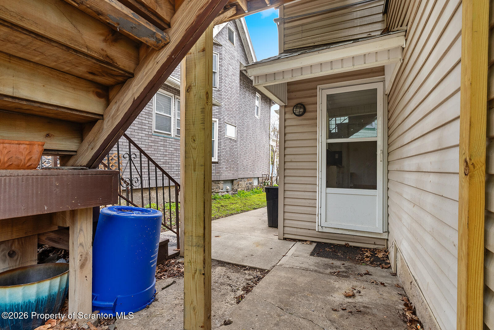 846 Monroe Avenue Scranton, PA 18510 - Photo 76 of 87 a view of a porch with wooden floor and stairs
