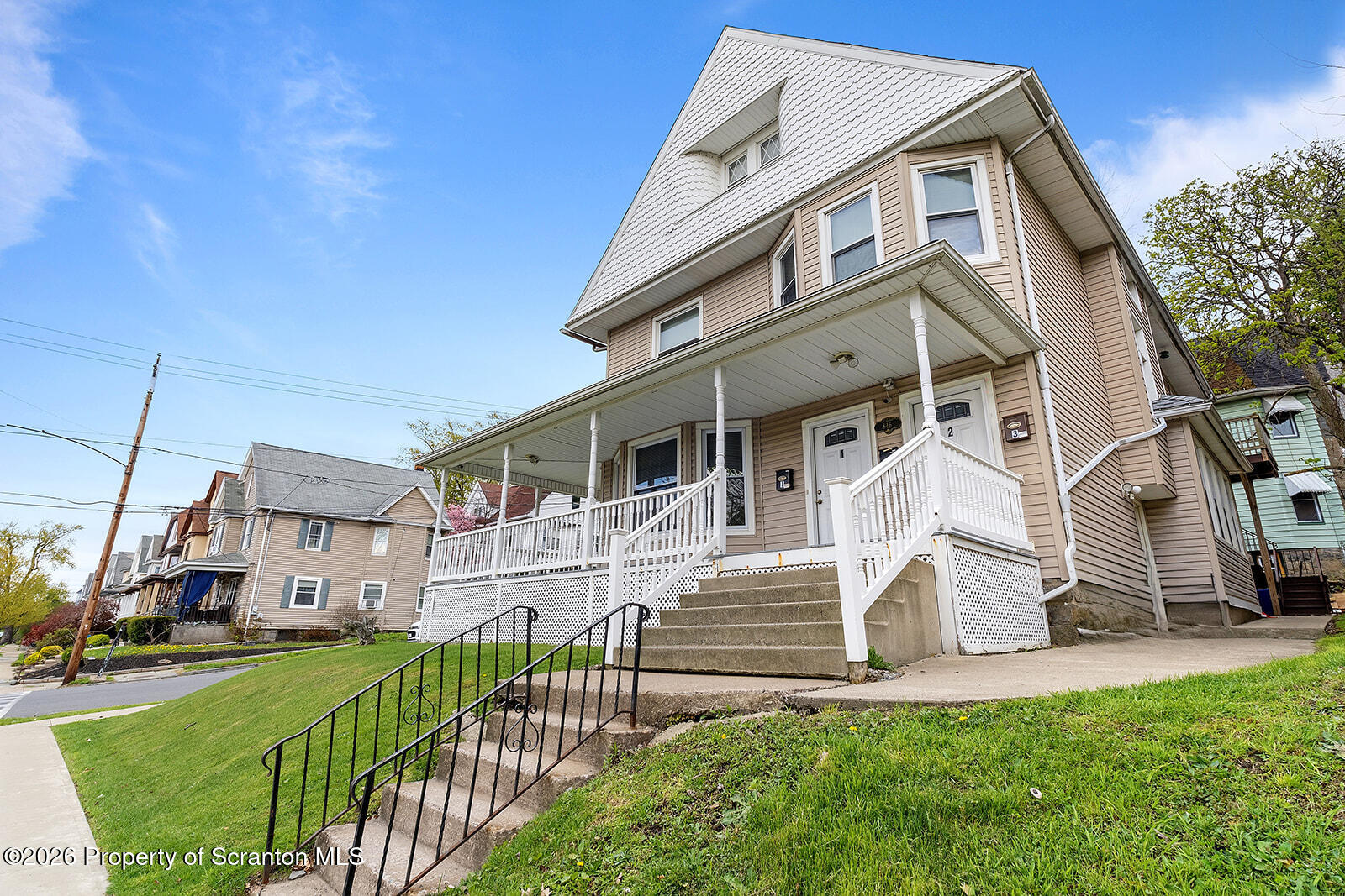 846 Monroe Avenue Scranton, PA 18510 - Photo 87 of 87 a view of a white house with a big yard plants and large trees