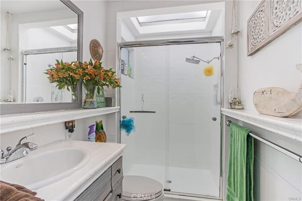 31711 Fairview Road Laguna Beach, CA 92651 - Photo 14 of 20 a bathroom with a sink and mirror