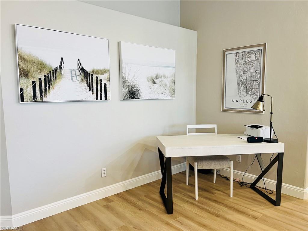 1709 Marsh Run Naples, FL 34109 - Photo 7 of 19 a view of a workspace with furniture
