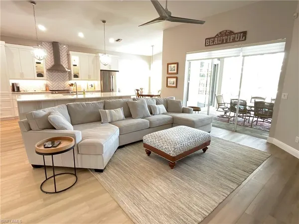 a living room with furniture and a table