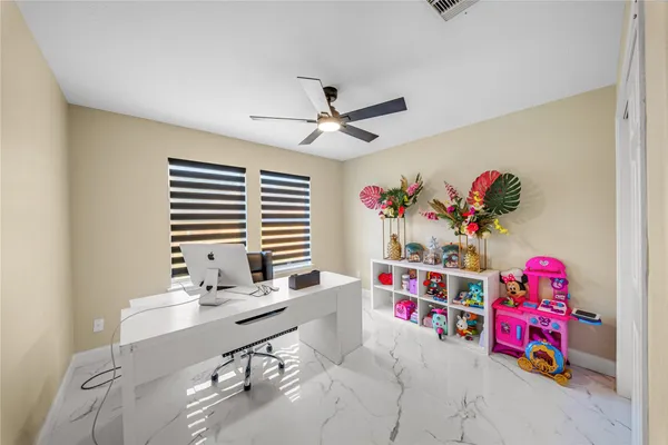 a room with toys and a chandelier