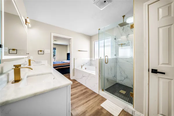 a kitchen with a sink and refrigerator