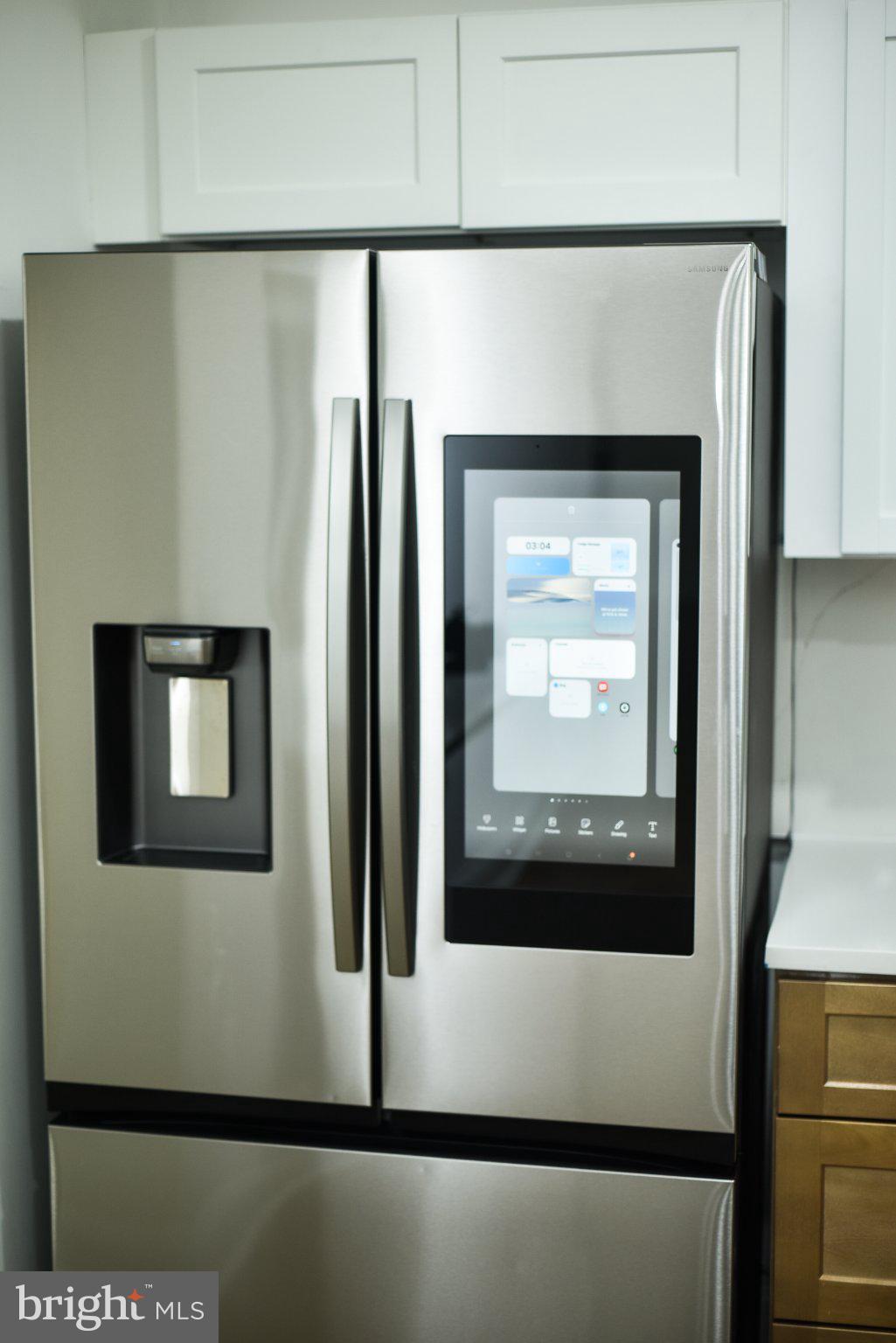 3704 Suitland Road Southeast Washington, DC 20020 - Photo 16 of 70 Sleek stainless steel refrigerator.